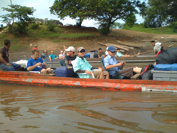 Canoes Going up river